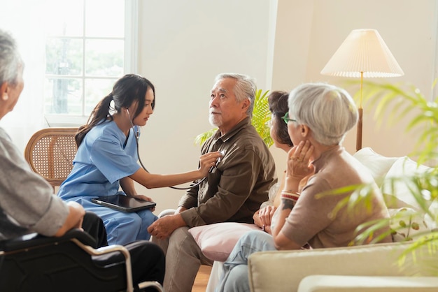 Caregiver and elderly client enjoying conversation and activities together at home